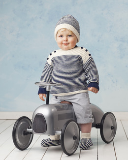 Beskrivning Tröja, kofta, mössa och strumpor