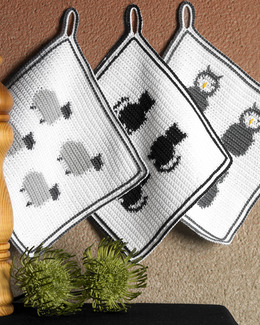 Beskrivning Grytlappar med djur