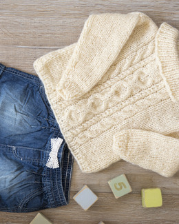 Beskrivning Tröja med flätmönster