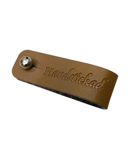 Lädermärke Handstickad