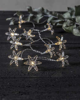Star Trading Batteridriven Ljusslinga med transparenta blommor, 135cm.